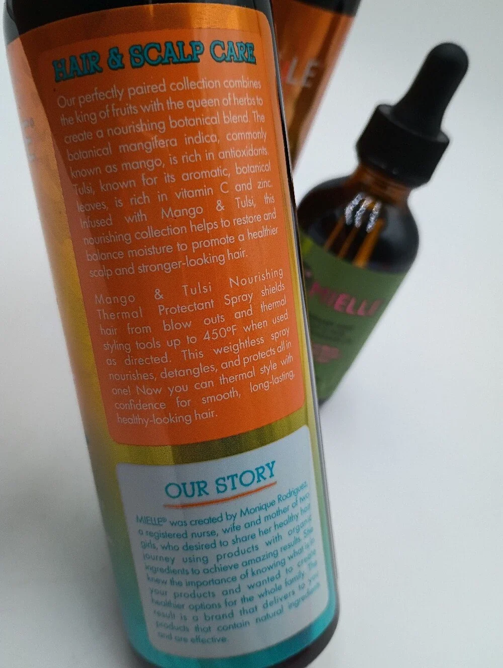 Mielle Haircare Scalp & Hair Strengthening Oil And Thermal Protectant Spray.